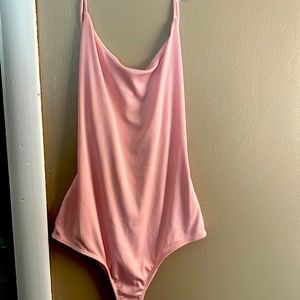 Never worn pink body suit